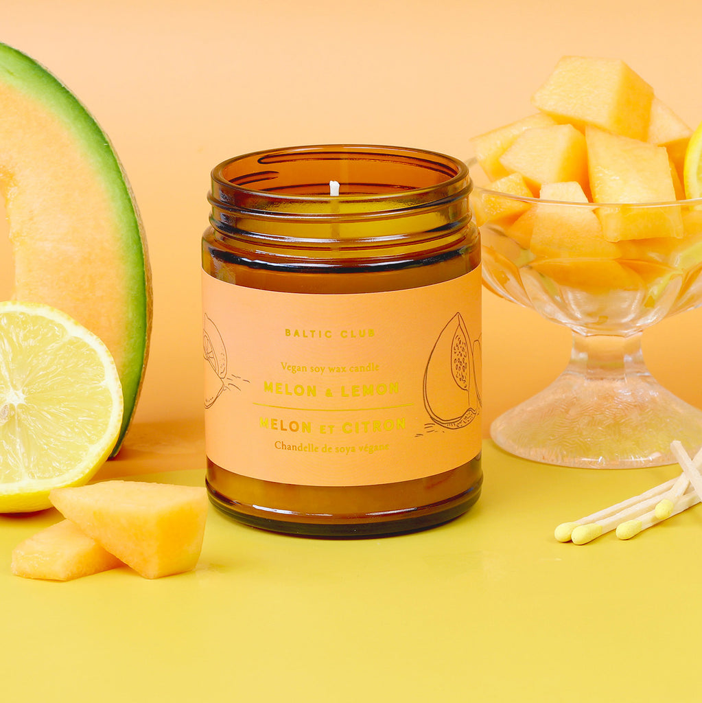 Melon and Lemon Soy Candle with fruits in a yellow ambiance