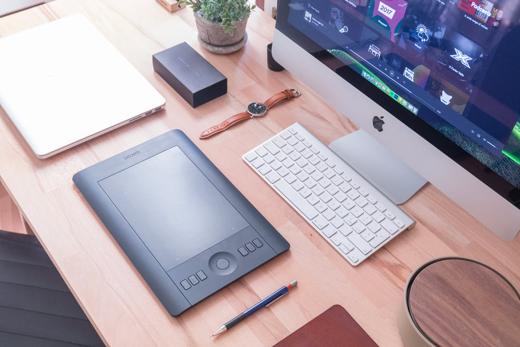 Desk with graphic tablette and computer