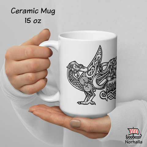 This beautiful ceramic mug is decorated with unique original art featuring Odin's ravens Hugin & Munin in classic Nordic knots and dot style by Swedish artist Micke Johansson. Norhalla.com