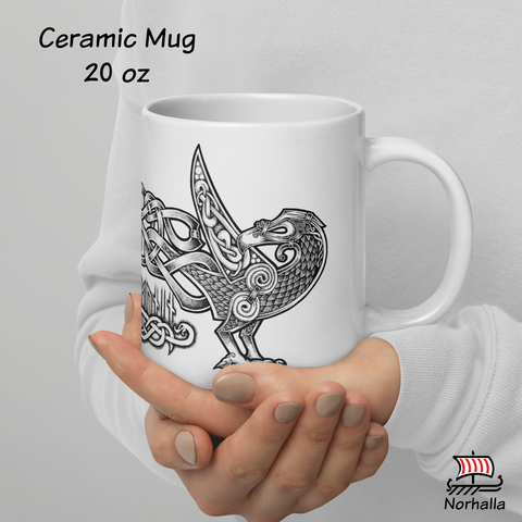 This beautiful ceramic mug is decorated with unique original art featuring Odin's ravens Hugin & Munin in classic Nordic knots and dot style by Swedish artist Micke Johansson. Norhalla.com