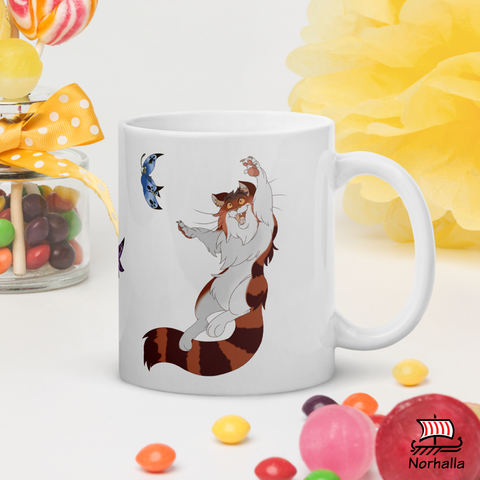 This beautiful ceramic mug is decorated with unique original art from our children's book series featuring Freyja's cats Beegul & Treegul by artist Kathryn Massey Argote. Norhalla.com