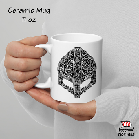 This beautiful ceramic mug is decorated with unique original art featuring a Viking helmet in classic Nordic knots and dot style by Swedish artist Micke Johansson. Norhalla.com