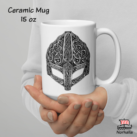 This beautiful ceramic mug is decorated with unique original art featuring a Viking helmet in classic Nordic knots and dot style by Swedish artist Micke Johansson. Norhalla.com