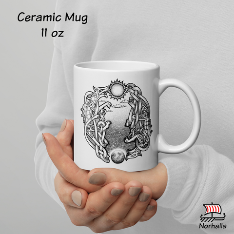 This beautiful ceramic mug is decorated with unique original art featuring the wolves Skoll and Hati chasing the sun and the moon in classic Nordic knots and dot style by Swedish artist Micke Johansson. Norhalla.com