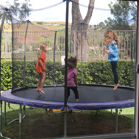 jumping on trampoline