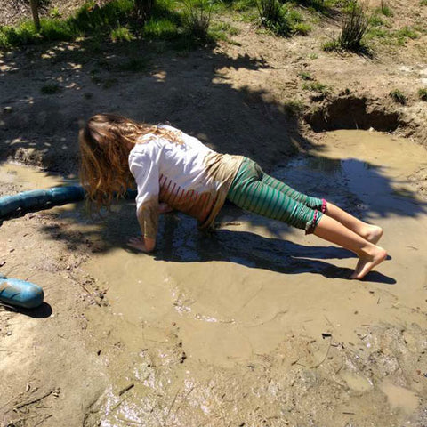 kids playing in mud