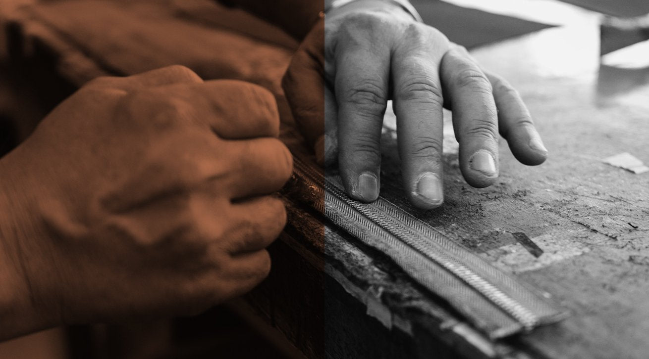 Photo of man working on leather