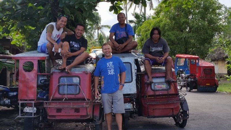 Bicol communities and Jason Thomas, CEO and Founder of Pili Hunters