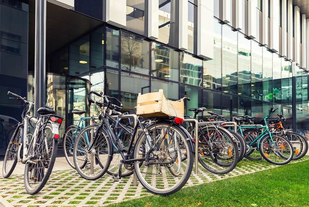 Bikes parked Infront of a building 