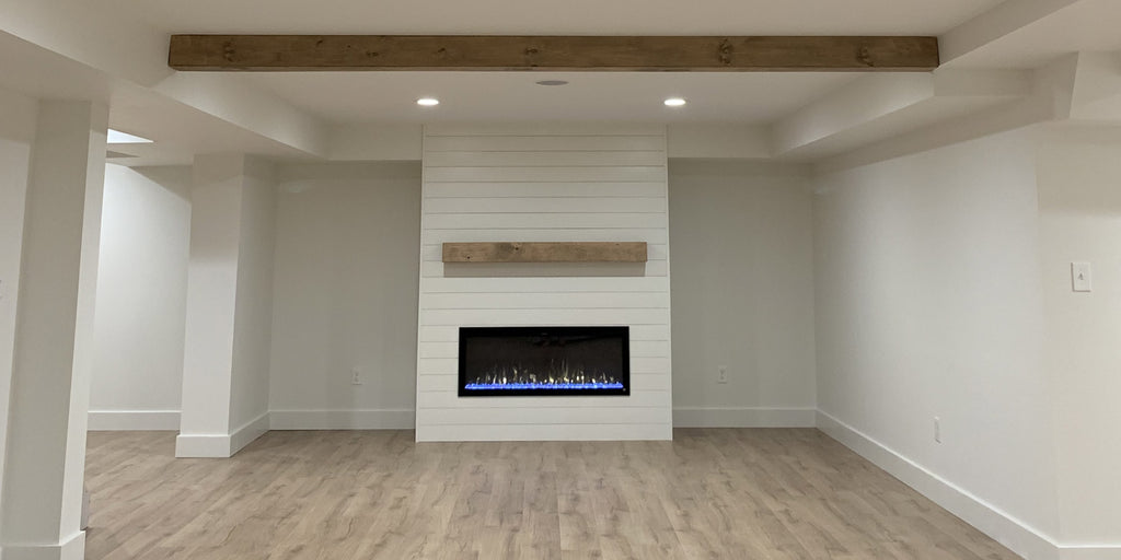 Touchstone Sideline Elite 50 Electric Fireplace in white shiplap wall in finished basement by simplymicheleb