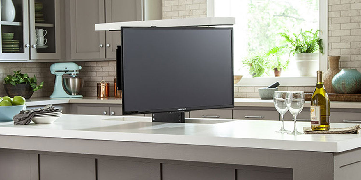 Touchstone Whisper Lift Swivel TV lift mechanism rotated sixty degrees in kitchen island installation