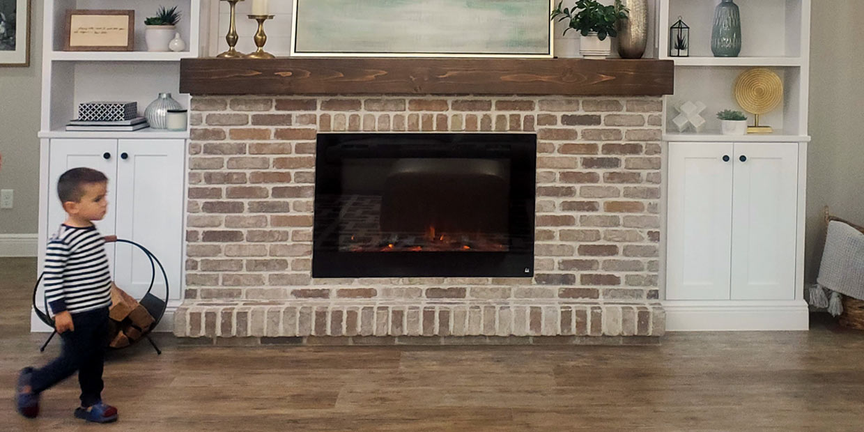 Touchstone Forte Electric Fireplace front flame display  is cool to the touch for added safety