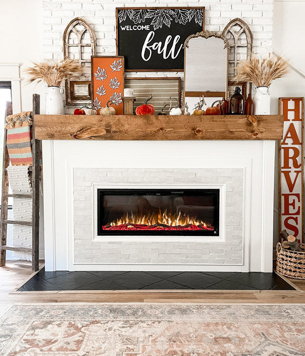 Finished DIY fireplace project by @redbrickfauxfarmhouse featuring Touchstone Sideline Elite 50 Electric Fireplace