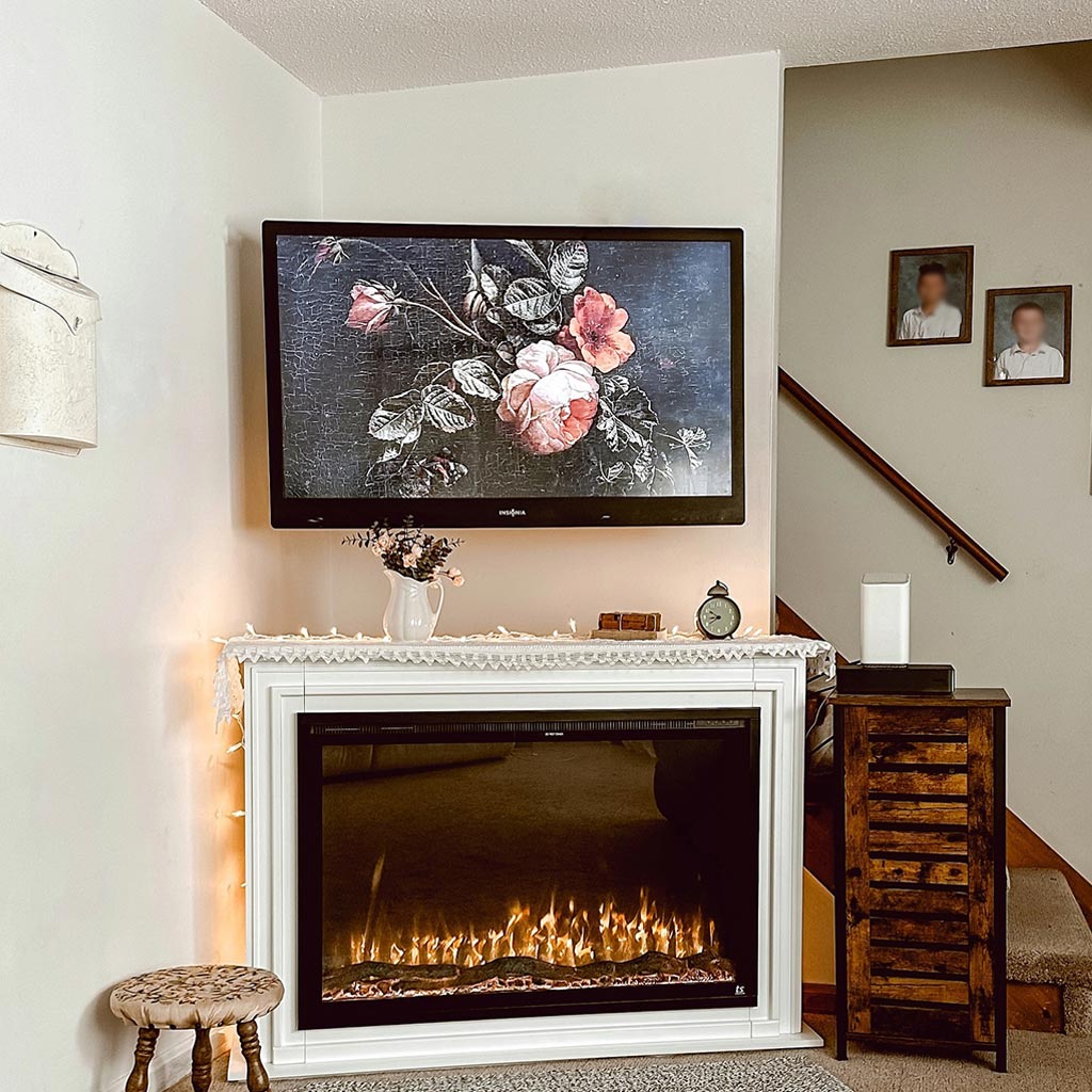 Touchstone Encase Surround Mantel with Forte Elite Smart Electric Fireplace positioned in corner by @designed.to.love
