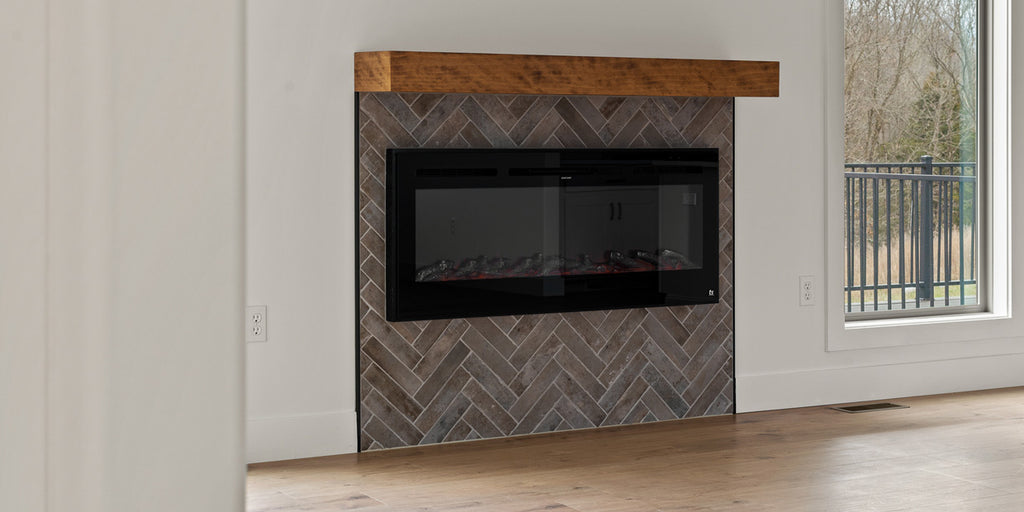 Touchstone Sideline Smart Electric Fireplace in a herringbone tile accent wall by Hemme Construction