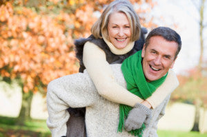 man giving woman piggyback ride