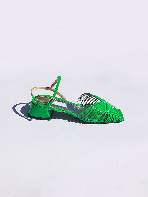 neon green track spikes