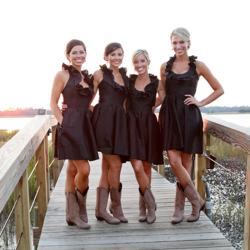 black dress with cowboy boots