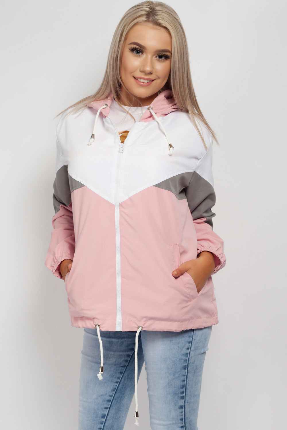 pink hooded rain mac