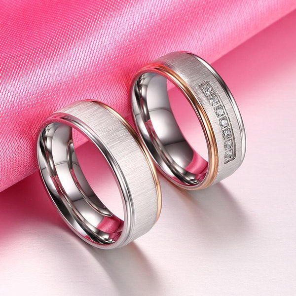 Matching silver and rose gold couples rings