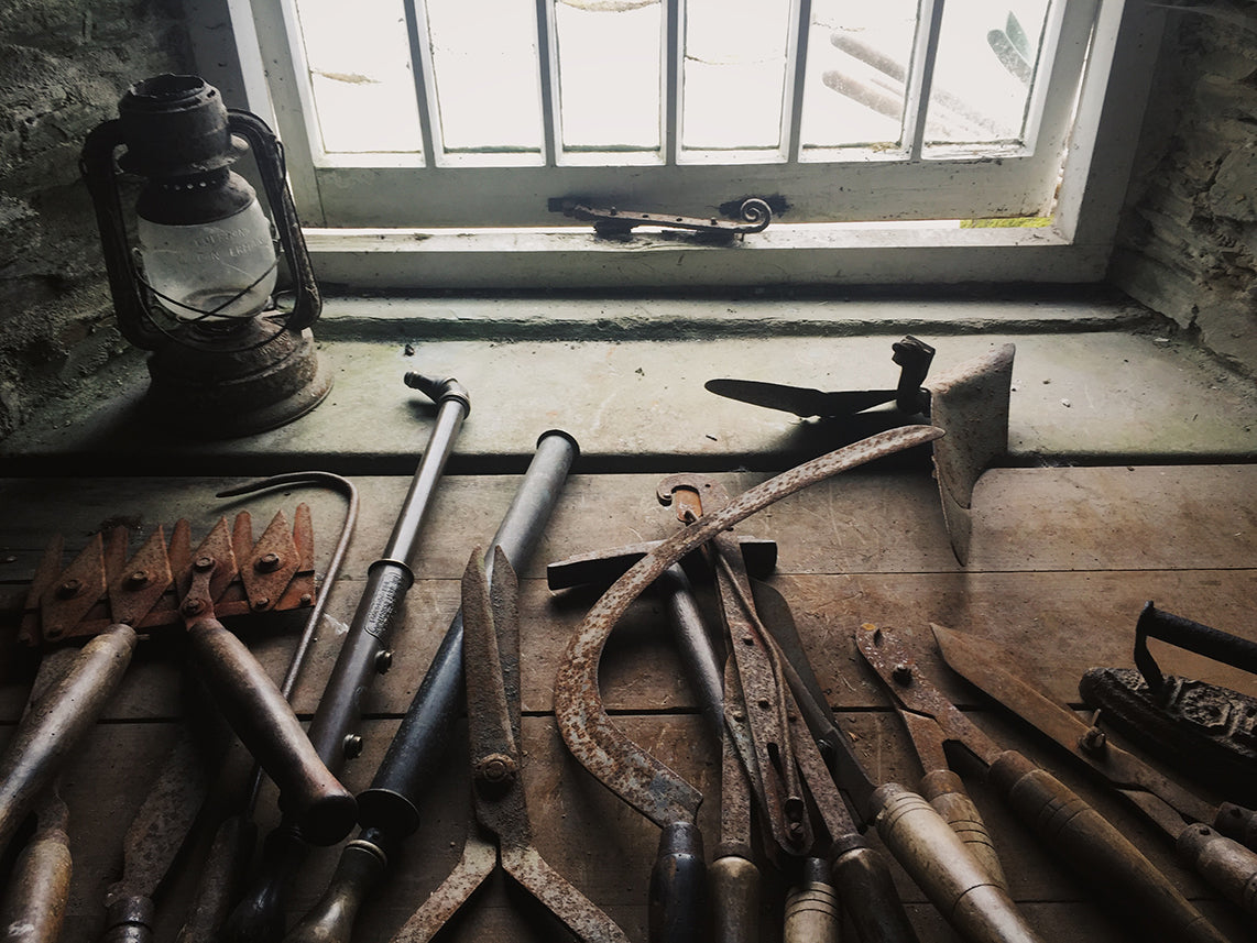 Tool shed and gardening tools at the Lost Gardens of Heligan by Dorte Januszewski
