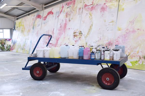 Paintings and paint trolley at Jessica Zoob's studio by Dorte Januszewski