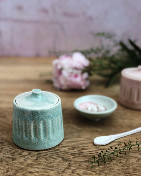 Hand thrown lidded porcelain vessel by Katie Robbins