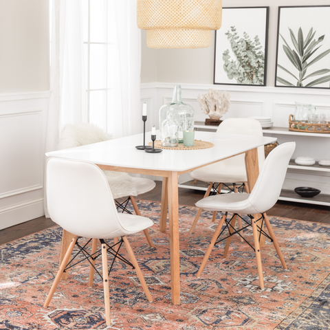 White and wood dining table with matching chairs