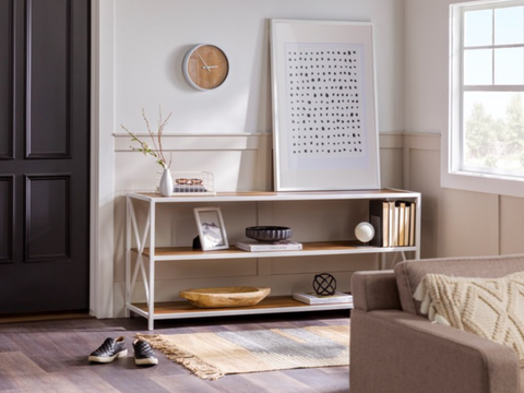 Contemporary console in an entryway with neutral decor