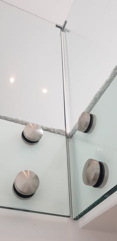 Stand offs used for internal custom glass balustrade