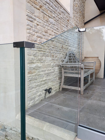 Glass clamps for external glass balustrade