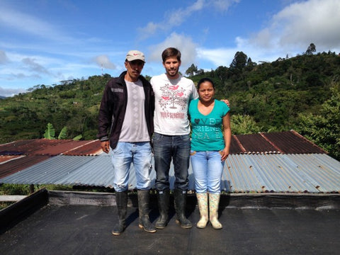 Standing with Jose and Francy on their drying patio