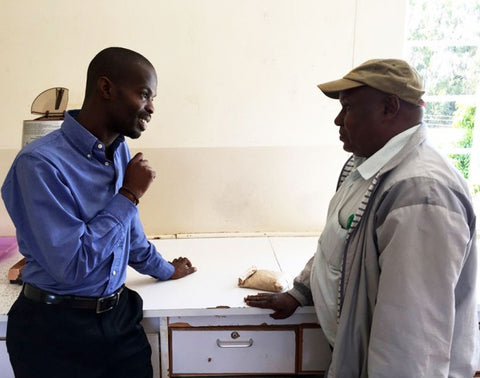 Mr Mburu and Uche talking soil