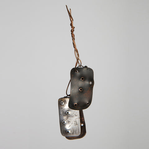 Military dog tag inspired pendant created from copper and silver based on the words duty and weep.