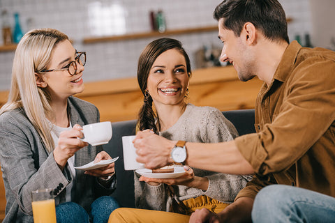 A group of three people is having fun and interacting with each other