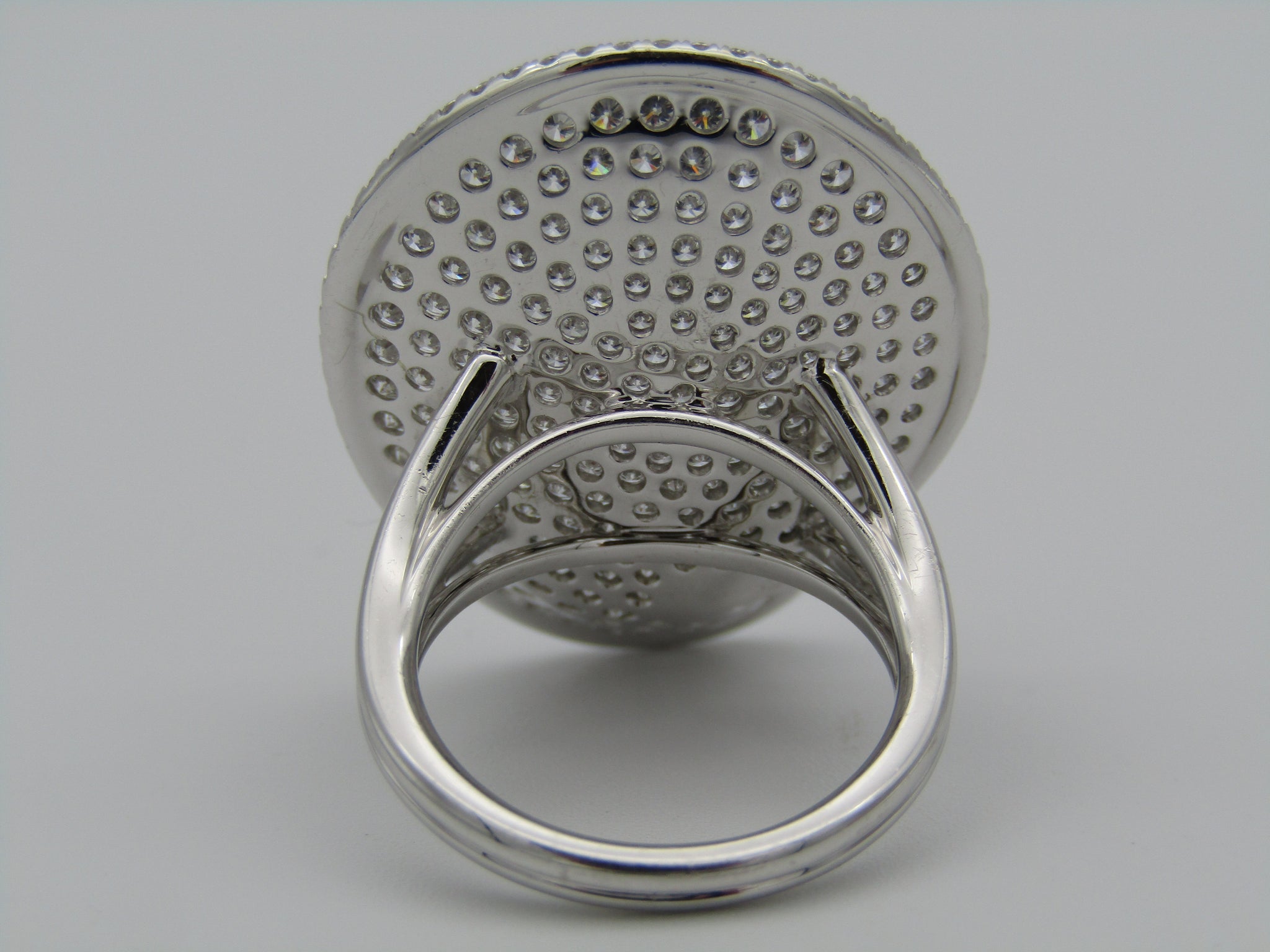 Designer lily-shaped diamond dress ring.