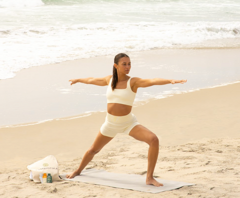 Woman stretching on the beach