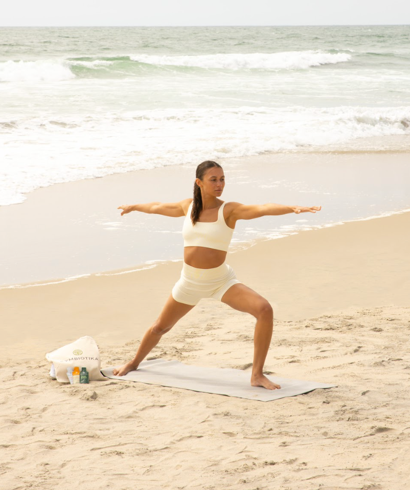 Woman stretching on beach