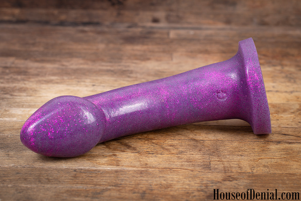 Godemiche Effulgence Ambit with a vibrating base in glitter magenta