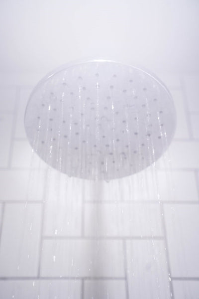 Shower head with water flowing from it