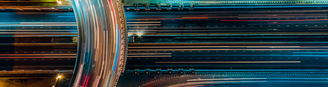 Vehicles on highway at night