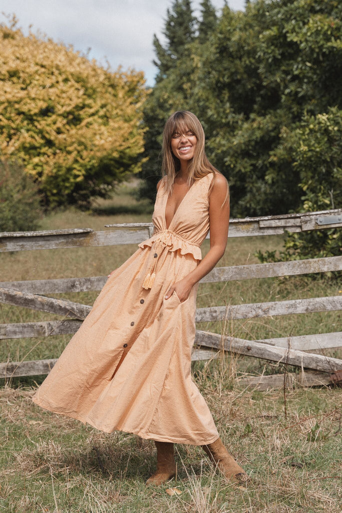 Woman smiling wearing a Byron Bay Maxi Dress outfit