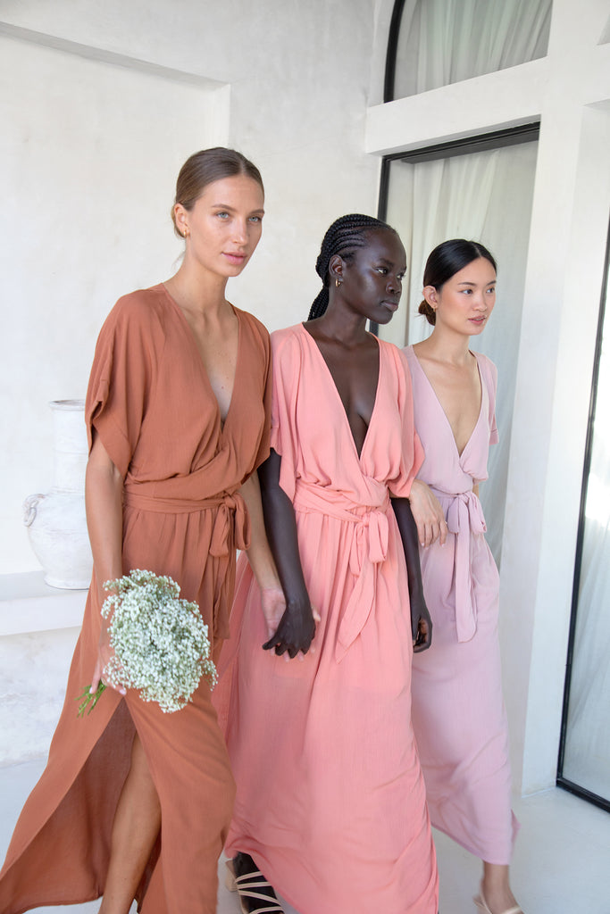 Three bridesmaids wearing Melody Maxi Dress in Cinnamon, Dusty Rose and Blush