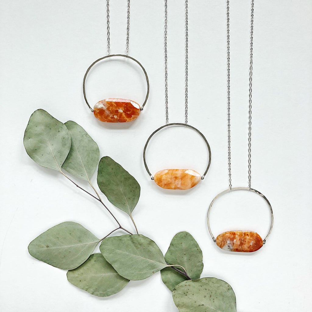 Third & Co. Studio of Grand Rapids, Michigan handmade semiprecious stone jewelry in small batch collections, available in wholesale and retail markets, spotted orange and cream chalcedony slab geometric necklace with silver