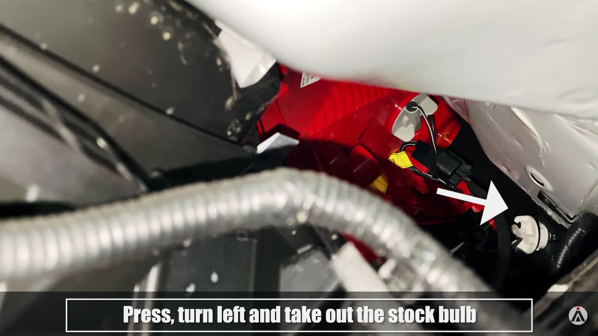 Press, turn left and take out the stock bulb