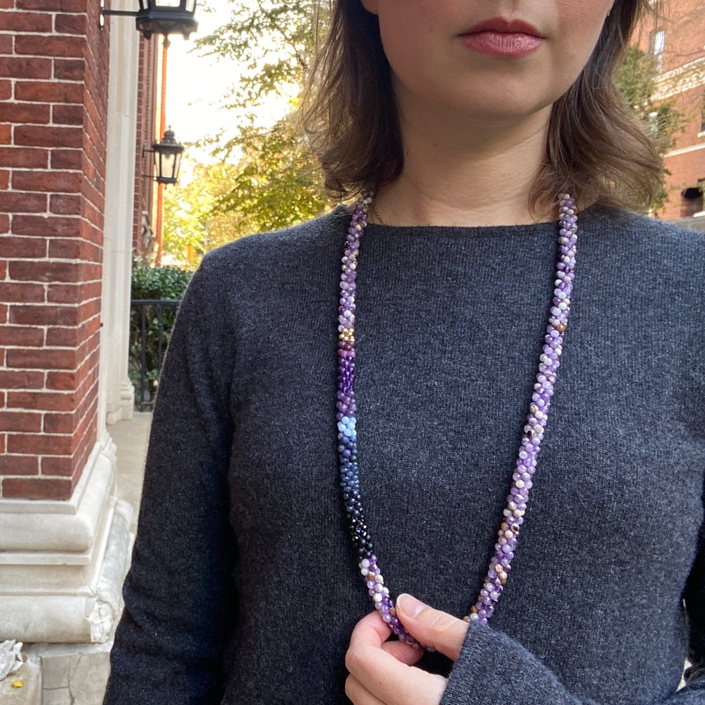 long purple bead necklace