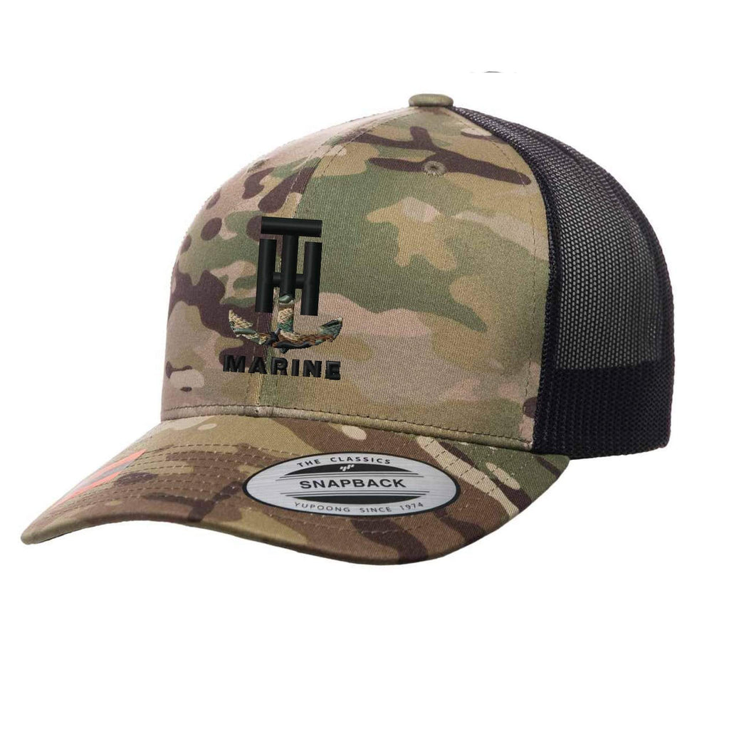 https://cdn.shopify.com/s/files/1/1828/6867/products/t-h-marine-camo-snapback-hat-28263621918763_1024x1024.jpg?v=1627252403