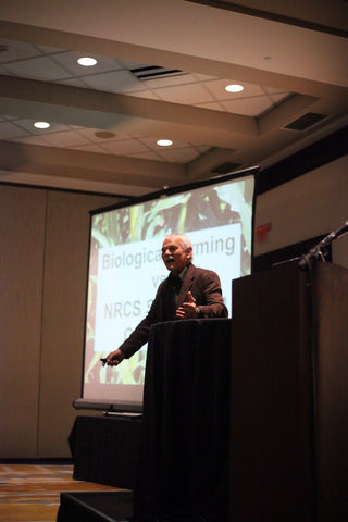 Gary Zimmer at the podium for the Eco-Ag conference