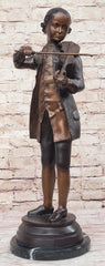 Bronze sculpture or Wolfgang Amadeus Mozart playing violin
