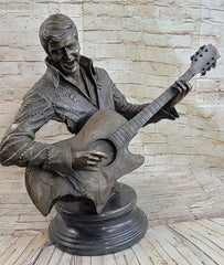 bronze bust sculpture of Elvis Presley playing an acoustic guitar